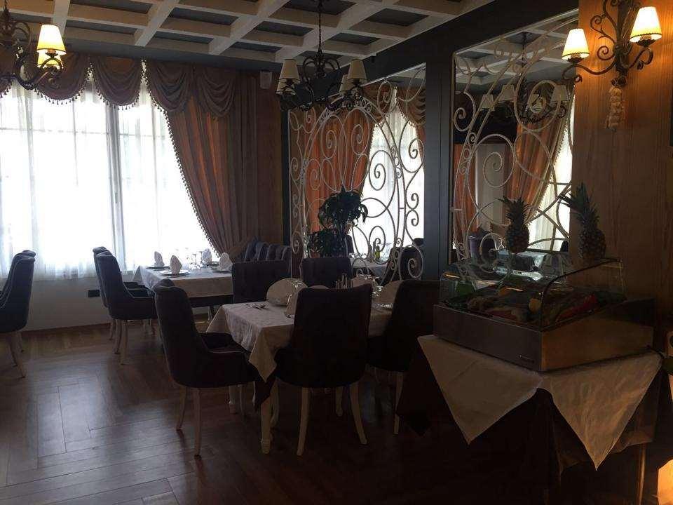 Hotel Mustang Vasqarr المطعم الصورة
